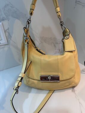 Coach Kristin convertible shoulder bag Coach Daisy Charm